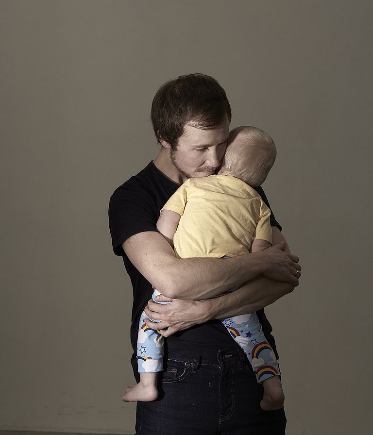 Man holds child