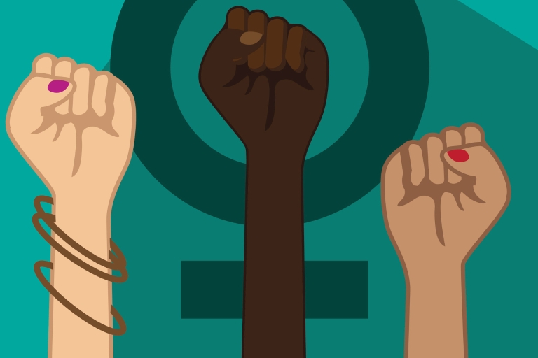An image of women's hands over a symbol