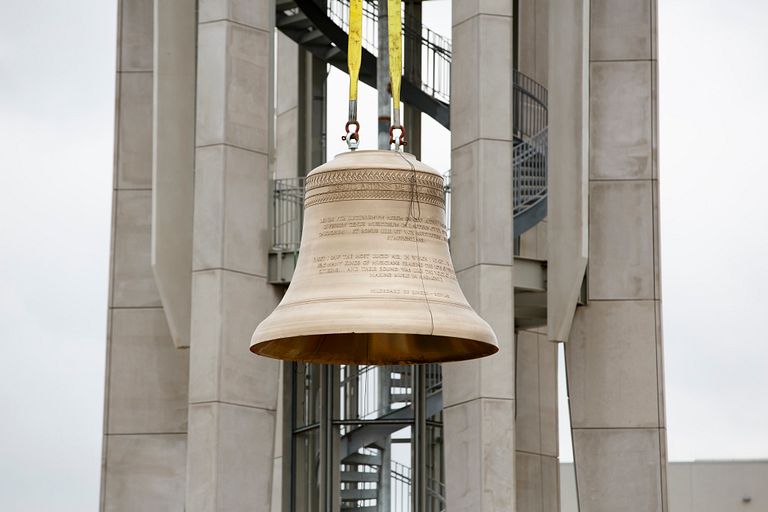 A bell is installed in the upgraded Arthur R. Metz Bicentennial Grand Carillon.