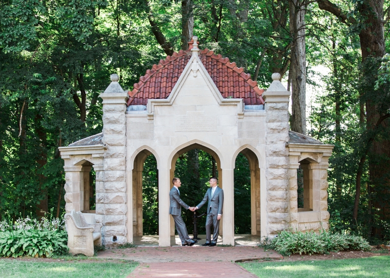 A couple stands in the Rose Well House