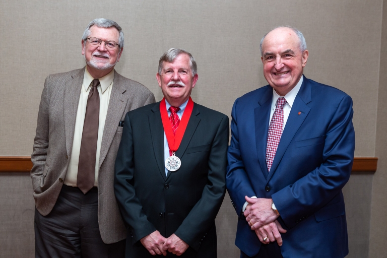 Mike Sample, Jeff Linder and Michael McRobbie standing together