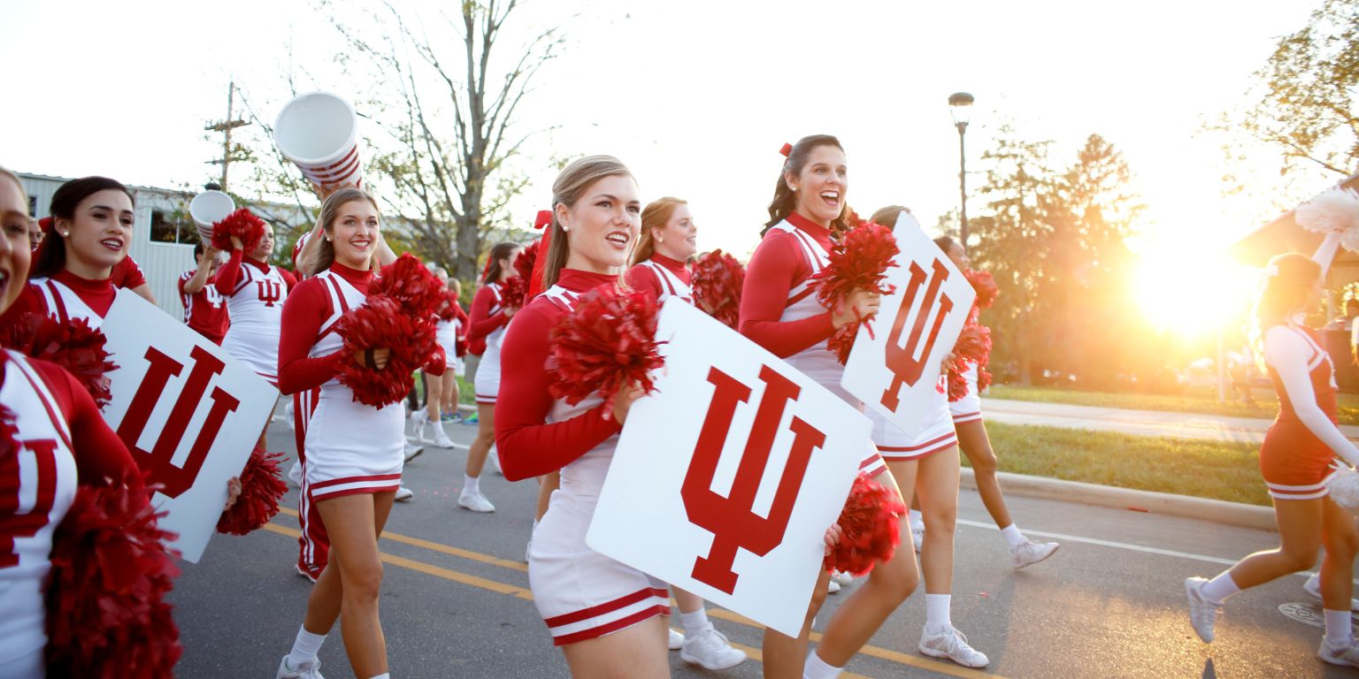 IU cheerleaders march in the homecoming parade.
