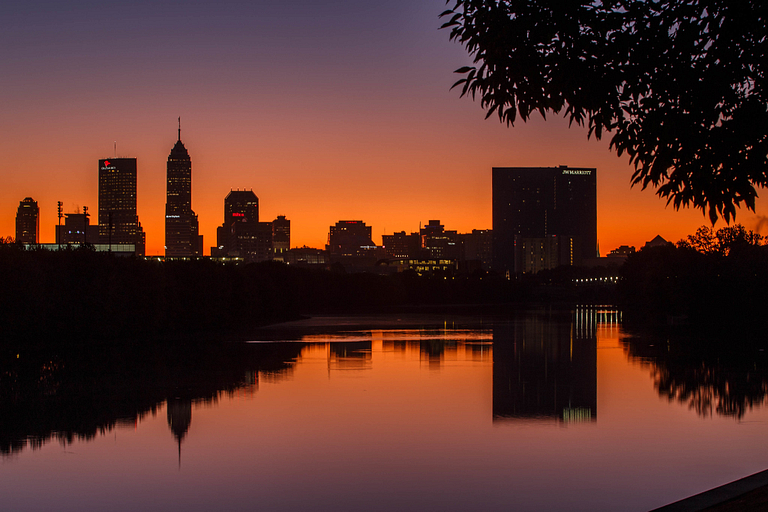Indianapolis skyline at sunrise from the White River Parkway