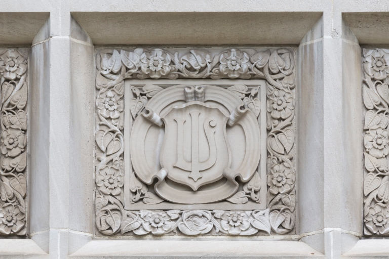 The IU trident on the side of a building