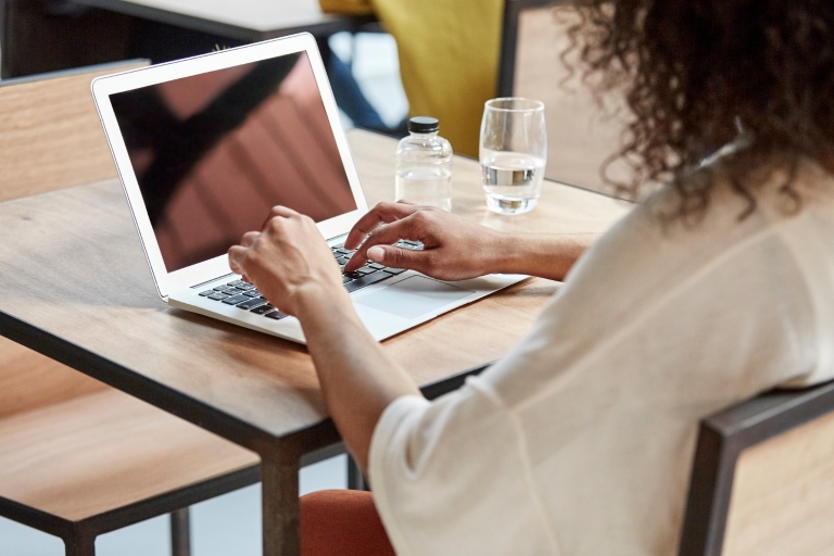 A woman using a laptop