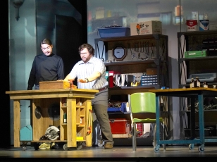 Steve Jobs with Woz at a workbench