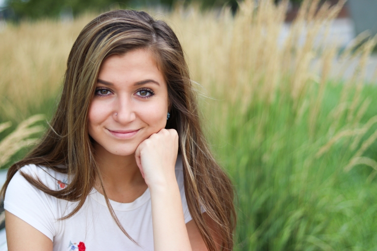 Sarah Platt poses for a photo to be included in the Recovery Month exhibit at IUPUI.