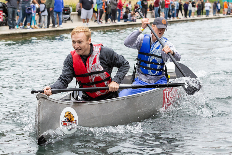 IUPUI students participate in the annual Regatta canoe race on the downtown canal.